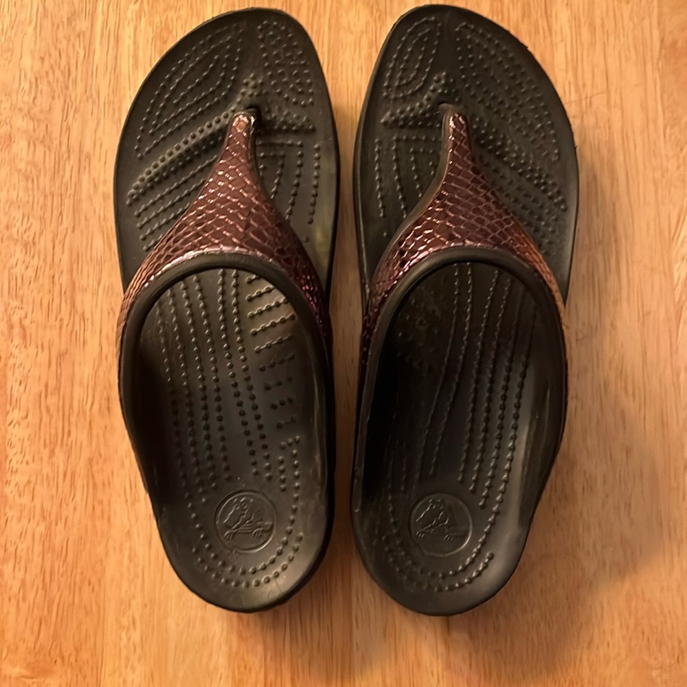 Women’s size six croc flip flops